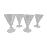4 glasses of moulded pressed glass wine on foot
