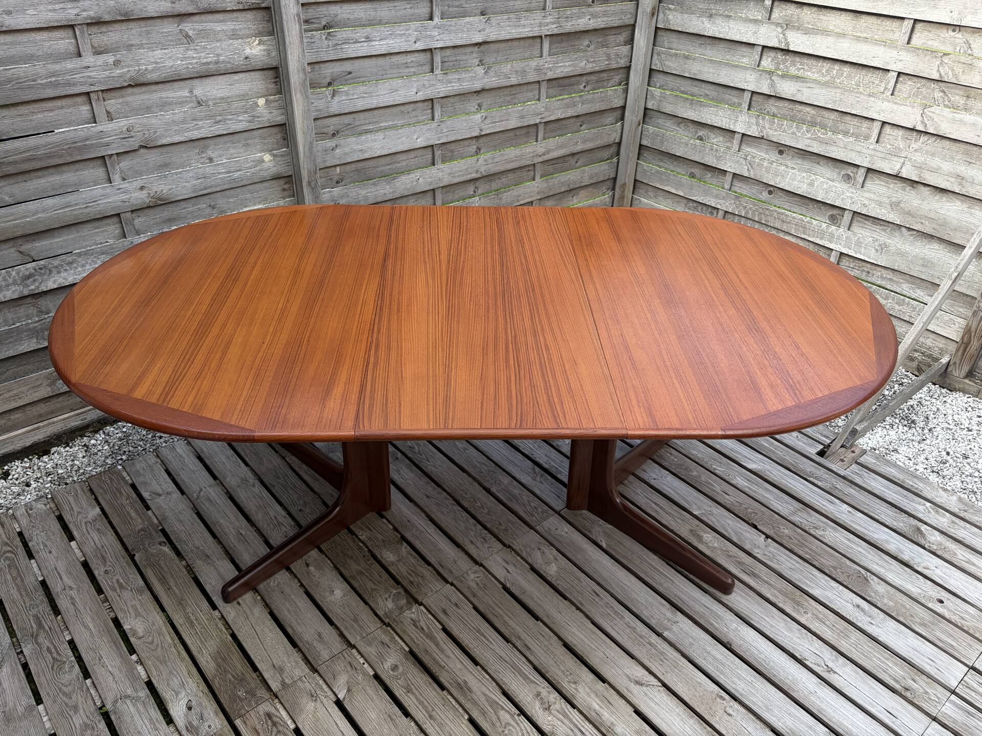 Oval teak table extendable with two leaves, Baumann style.