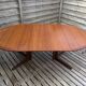 Oval teak table extendable with two leaves, Baumann style.