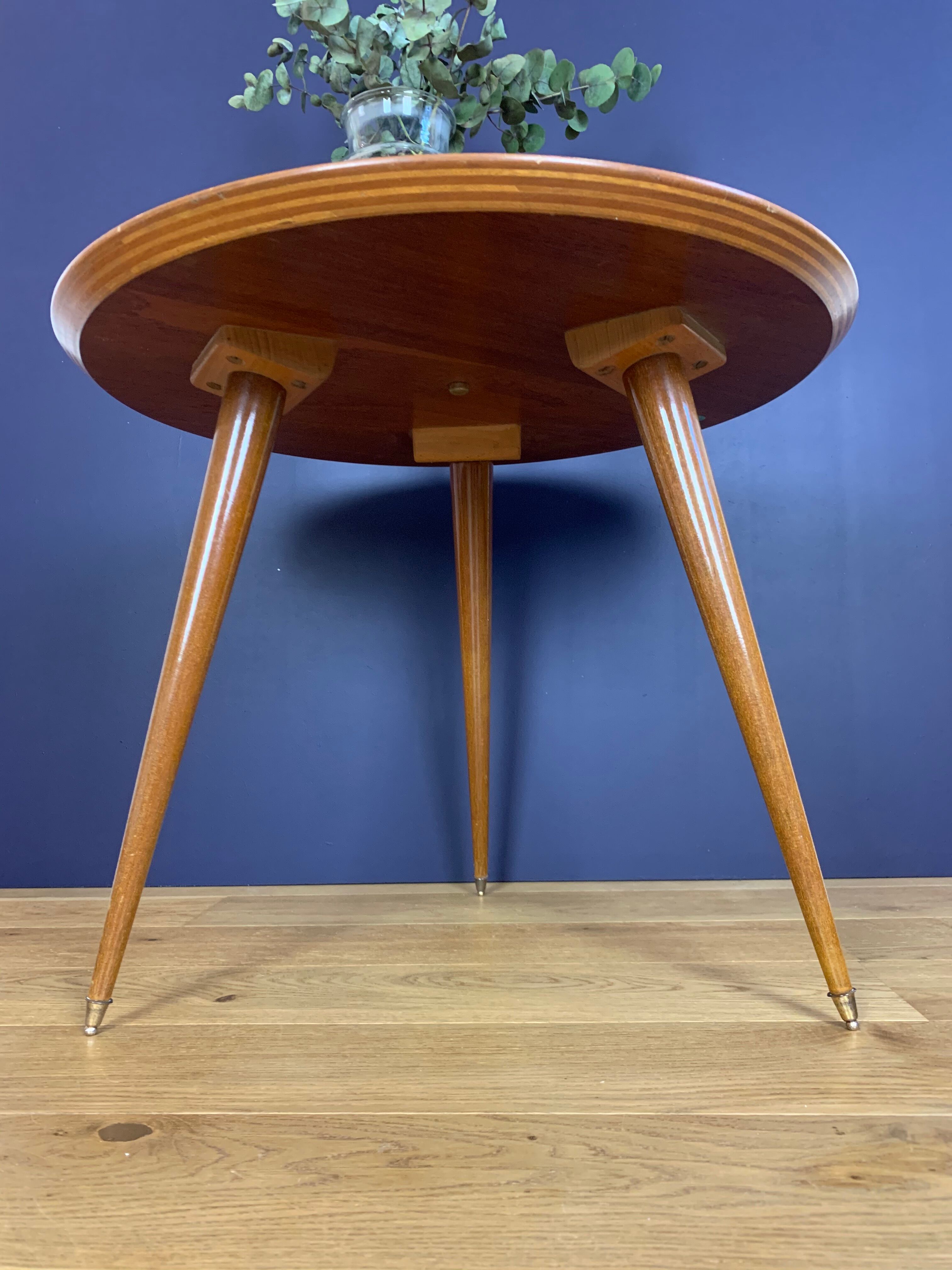Tripod round coffee table