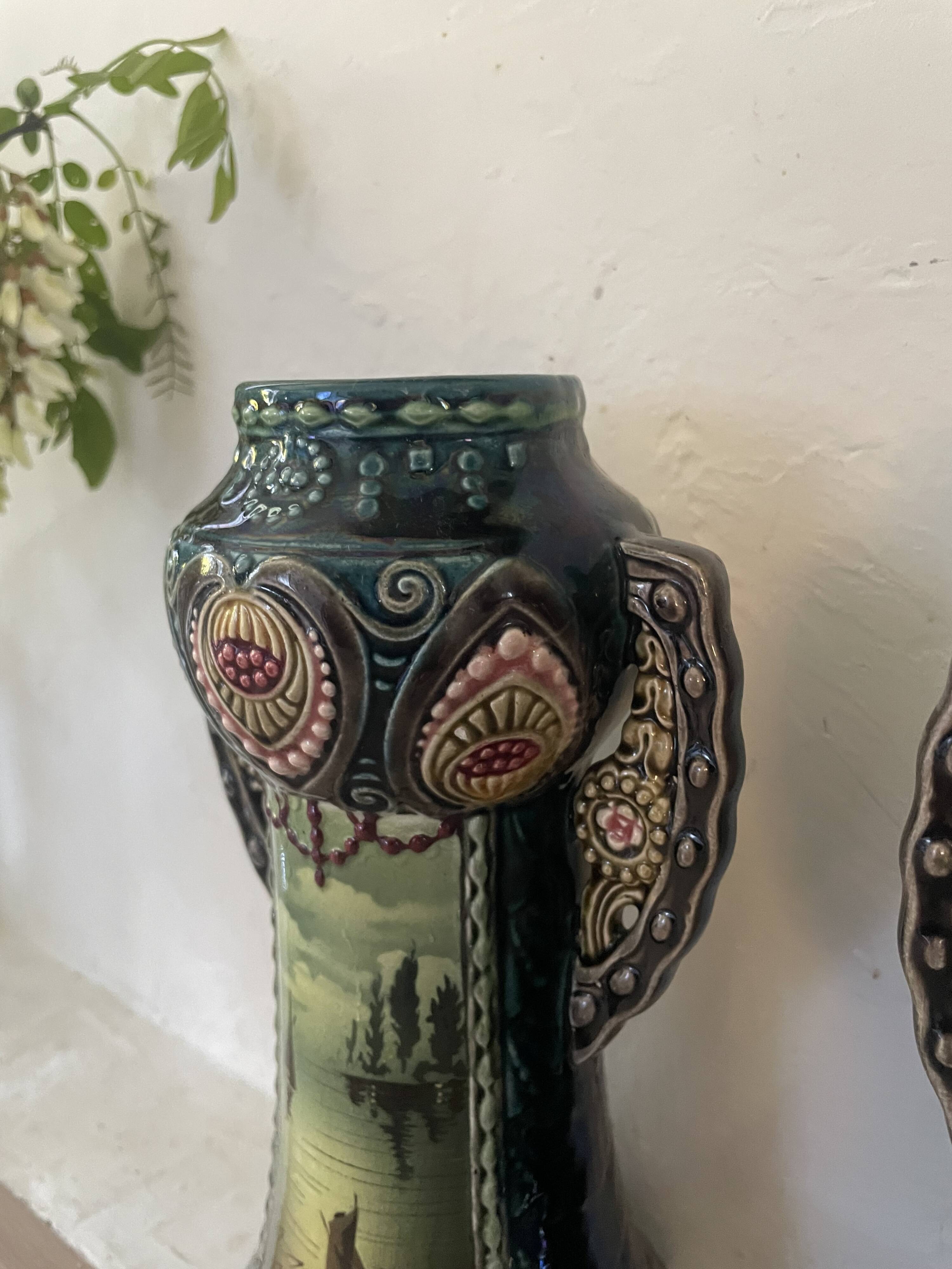 Pair of Art Nouveau slipware vases, hand-painted decoration.