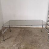 Table basse chrome et verre fumé