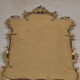 Mirror with baroque style parecloses in bronze 102 x 61 cm