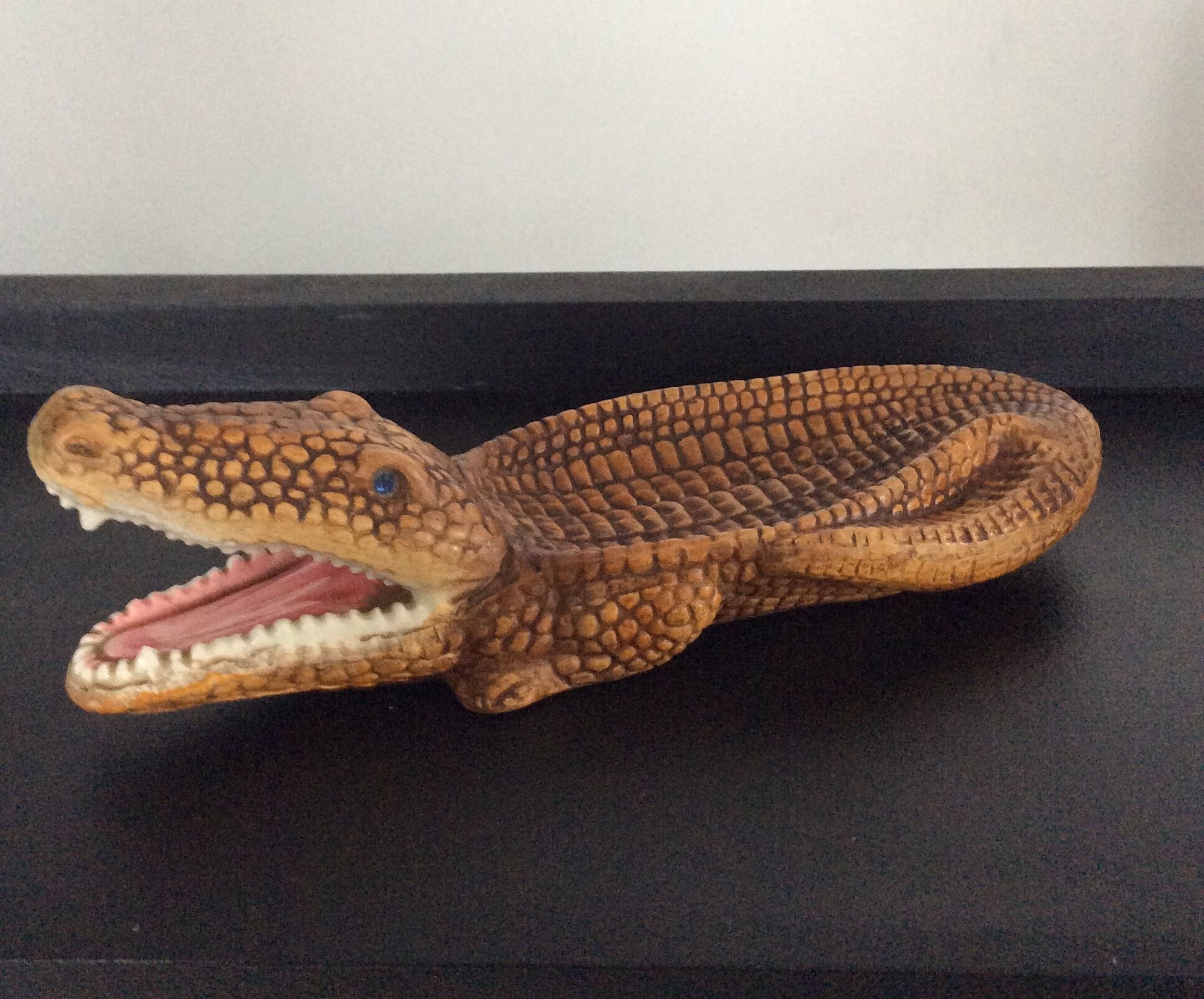 Empty vintage ceramic crocodile pocket