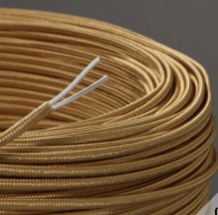 Turned wooden lamp, fabric cable, cotton lampshade.