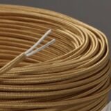 Turned wooden lamp, fabric cable, cotton lampshade.