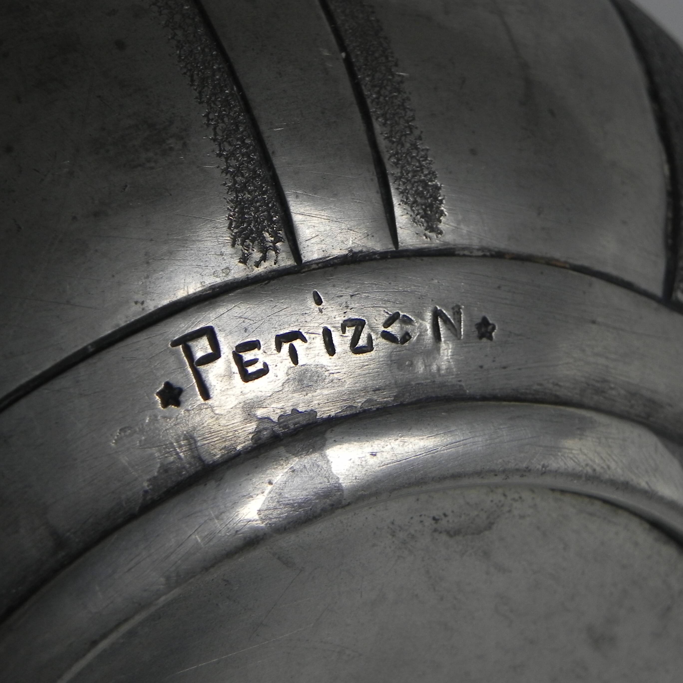 Art Nouveau pewter vase, signed PETIZON, early 20th century.