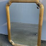 Miroir doré contour ligné