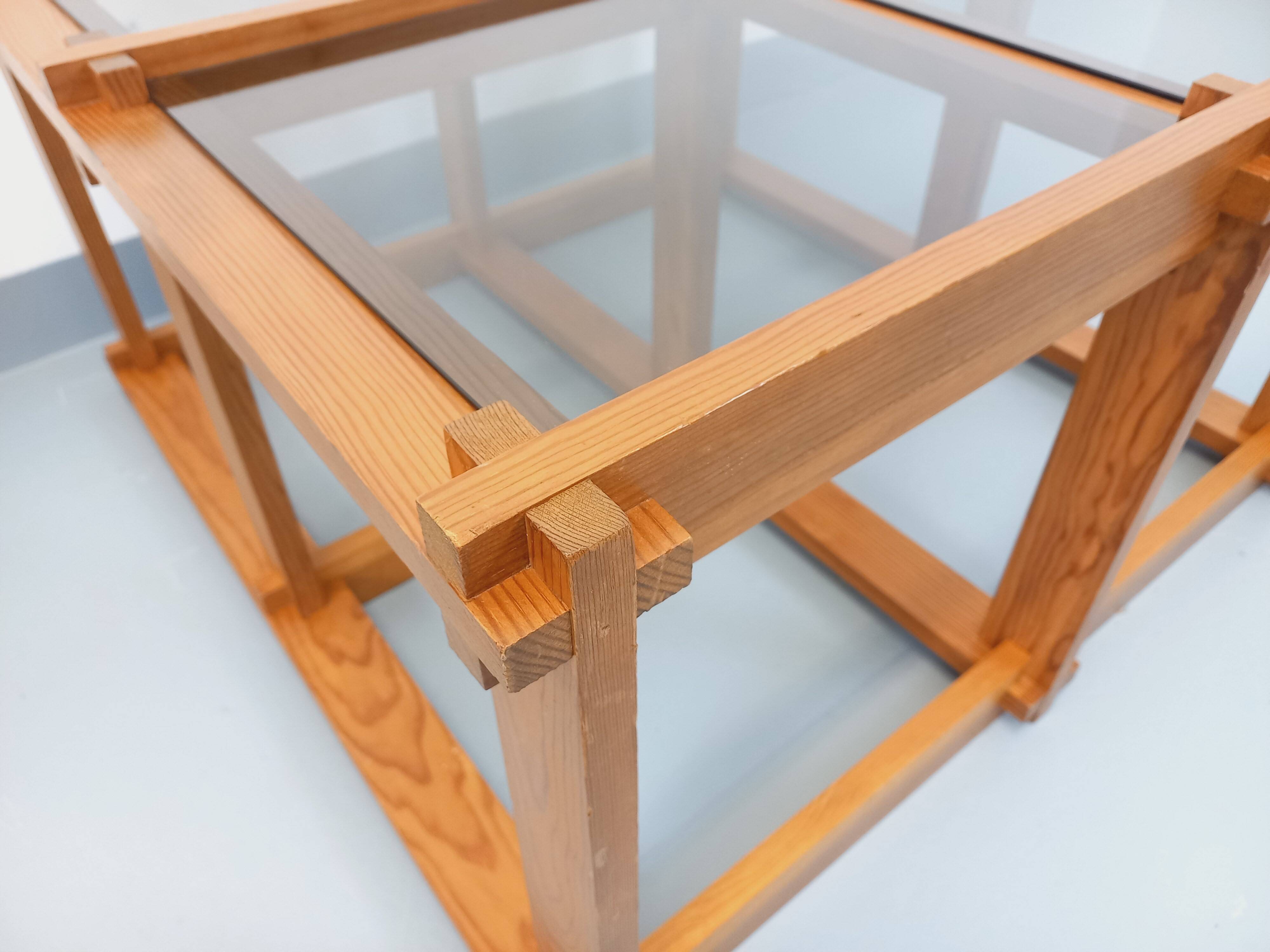 Vintage square coffee table in pine and smoked glass from the 70s and 80s.