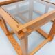 Vintage square coffee table in pine and smoked glass from the 70s and 80s.