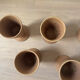 Lot of 8 vintage beige and brown enamelled stoneware mazagrans from the 1970s.
