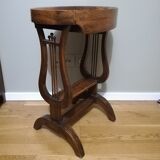 Guéridon ou sellette lyre en noyer