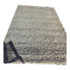 Rug in the style of a designer.