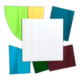 Colored mirror with an irregular shape