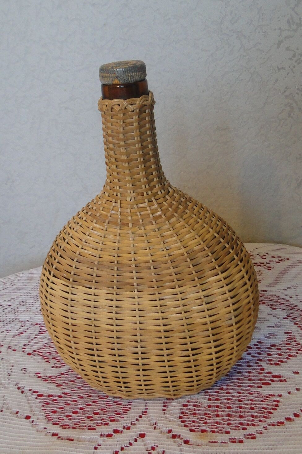 Vintage wicker covered flat bottle