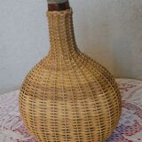Vintage wicker covered flat bottle