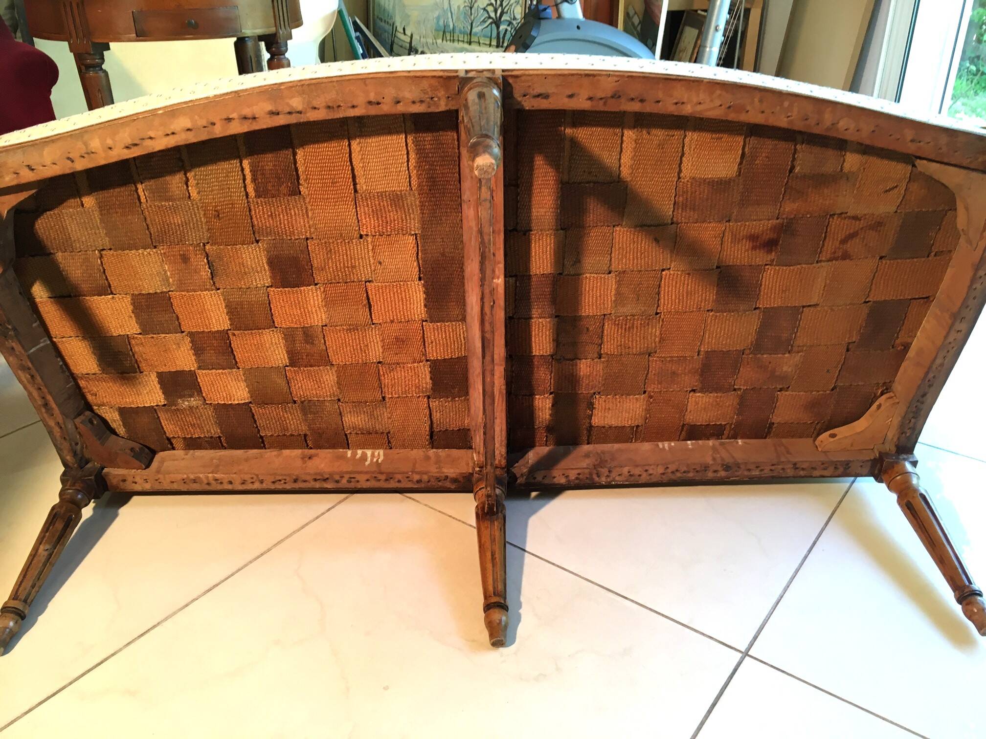 Canapé deux places d'époque Louis XVI entièrement retapissé