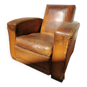 Club armchair in antique leather, vintage + sheepskin