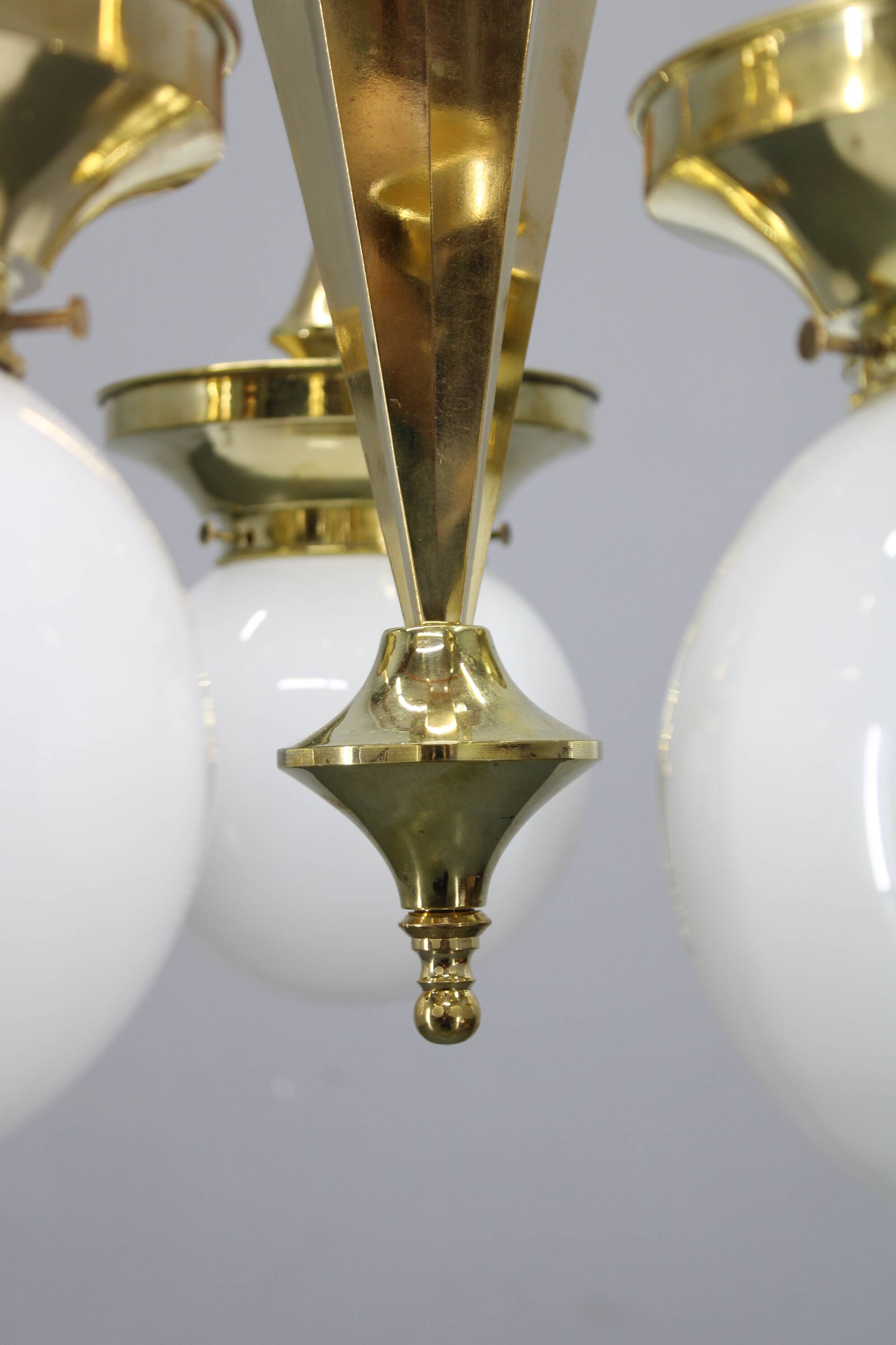 1930s Czechoslovak Art Deco brass chandelier with five opaline glass globes