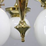 1930s Czechoslovak Art Deco brass chandelier with five opaline glass globes