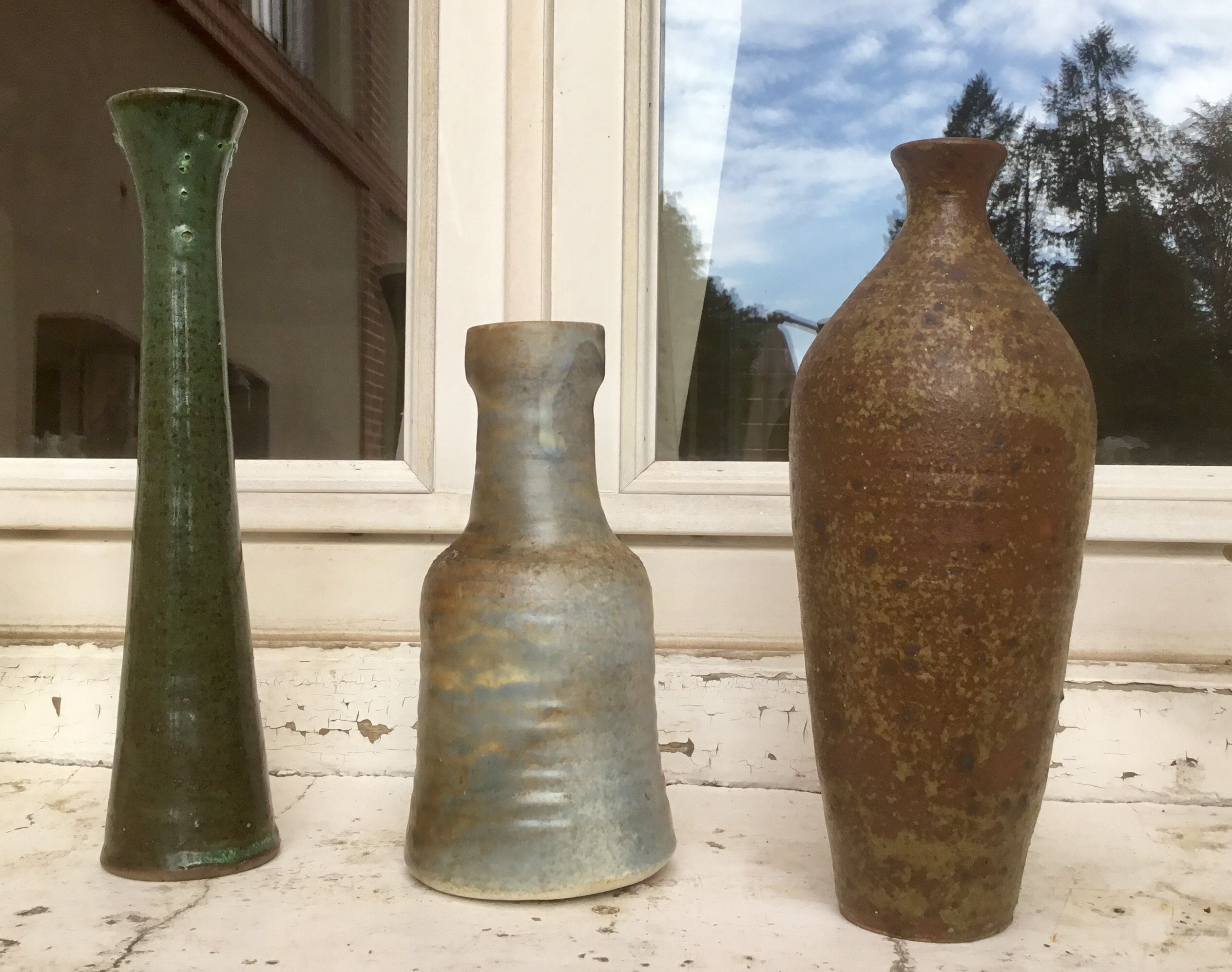 Vintage sandstone vase trio
