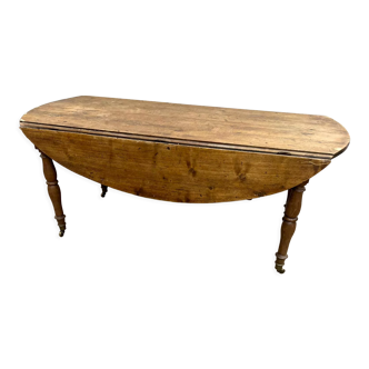 Louis Philippe wood dining table with shutters and casters