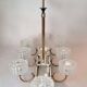 Eight-light chandelier in gilded brass and blue, 1950.