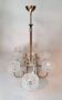 Eight-light chandelier in gilded brass and blue, 1950.