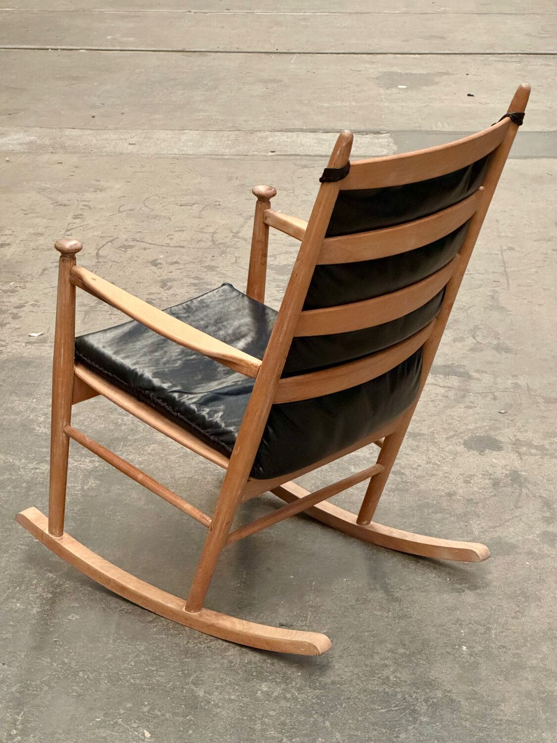 Scandinavian wooden and leather rocking chair