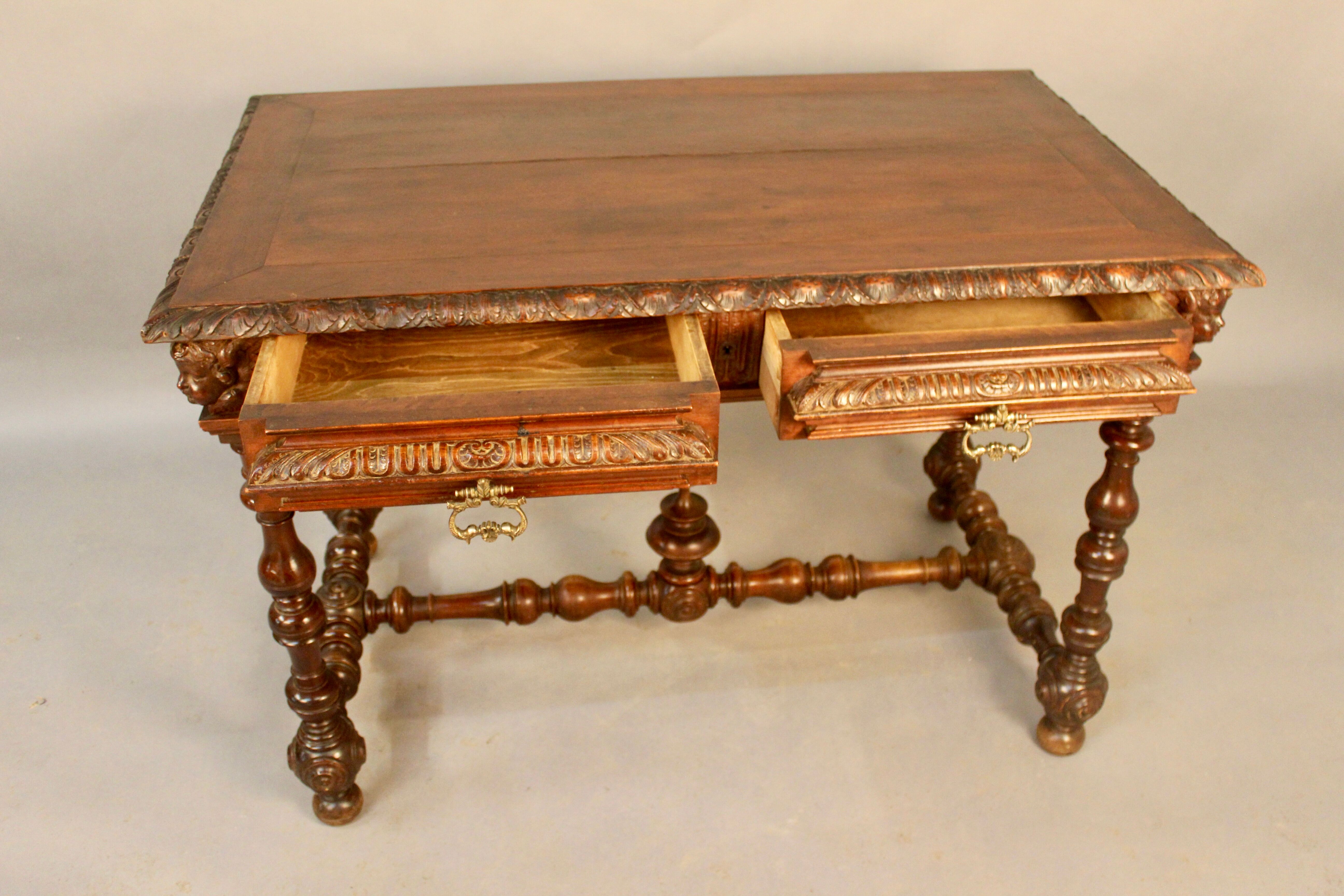 Louis XIII style writing table with Putti decoration