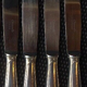Series of 11 large knives Christofle art deco