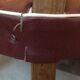 Skai chair binds wine and wooden footpieces and armrests