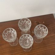 4 cut glass liqueur glasses on stems