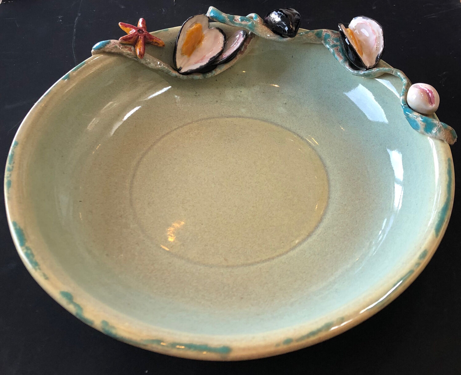 Paris ceramic dish with slip decoration, by Suzy Coste
