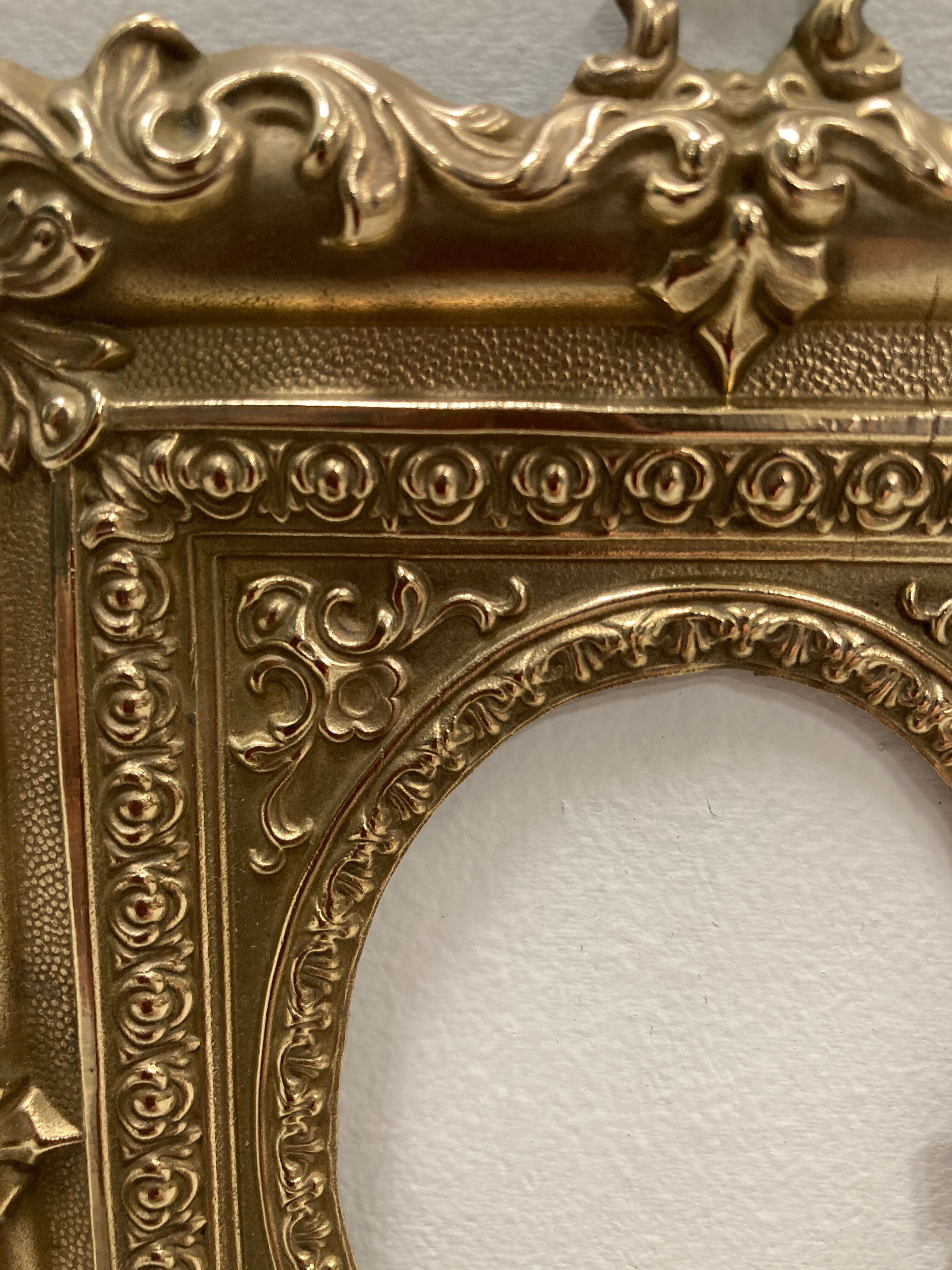 Pair of brass photo frames