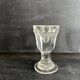 Set of antique liqueur glasses in thick glass, bistro style.