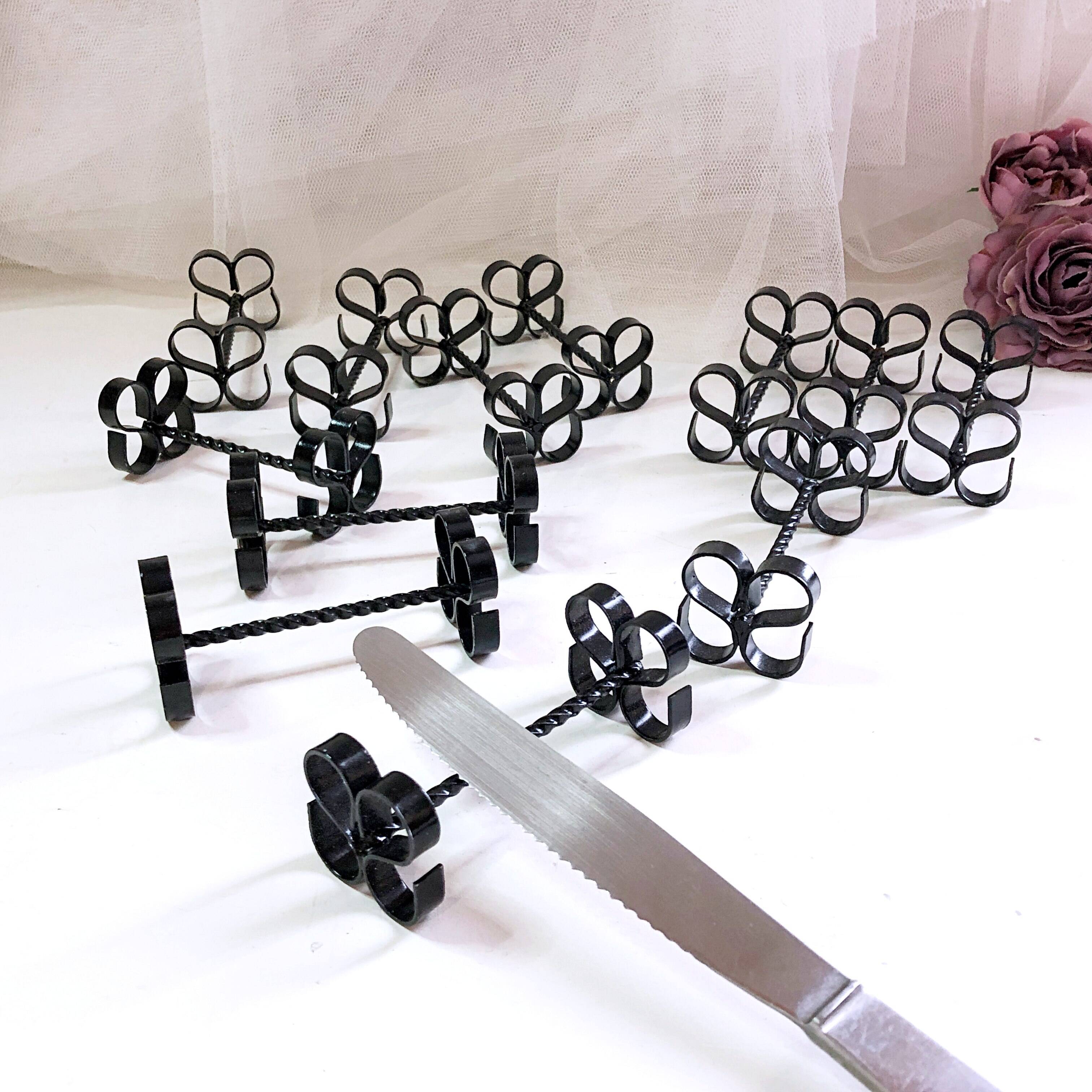 Box of 12 wrought iron cutlery holders