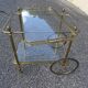 Rolling serving table in neo-classical Louis XVI style.