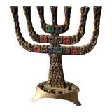 Menorah/Candlestick with 7 light arms. In old gold patinated brass/Decor 12 astrological signs. Engraved Jerusalem. Height 14 cm