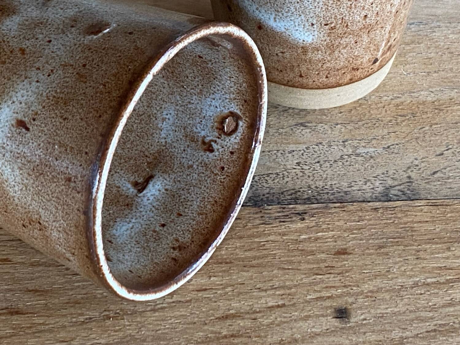 2 stoneware mugs by Roger Jacques