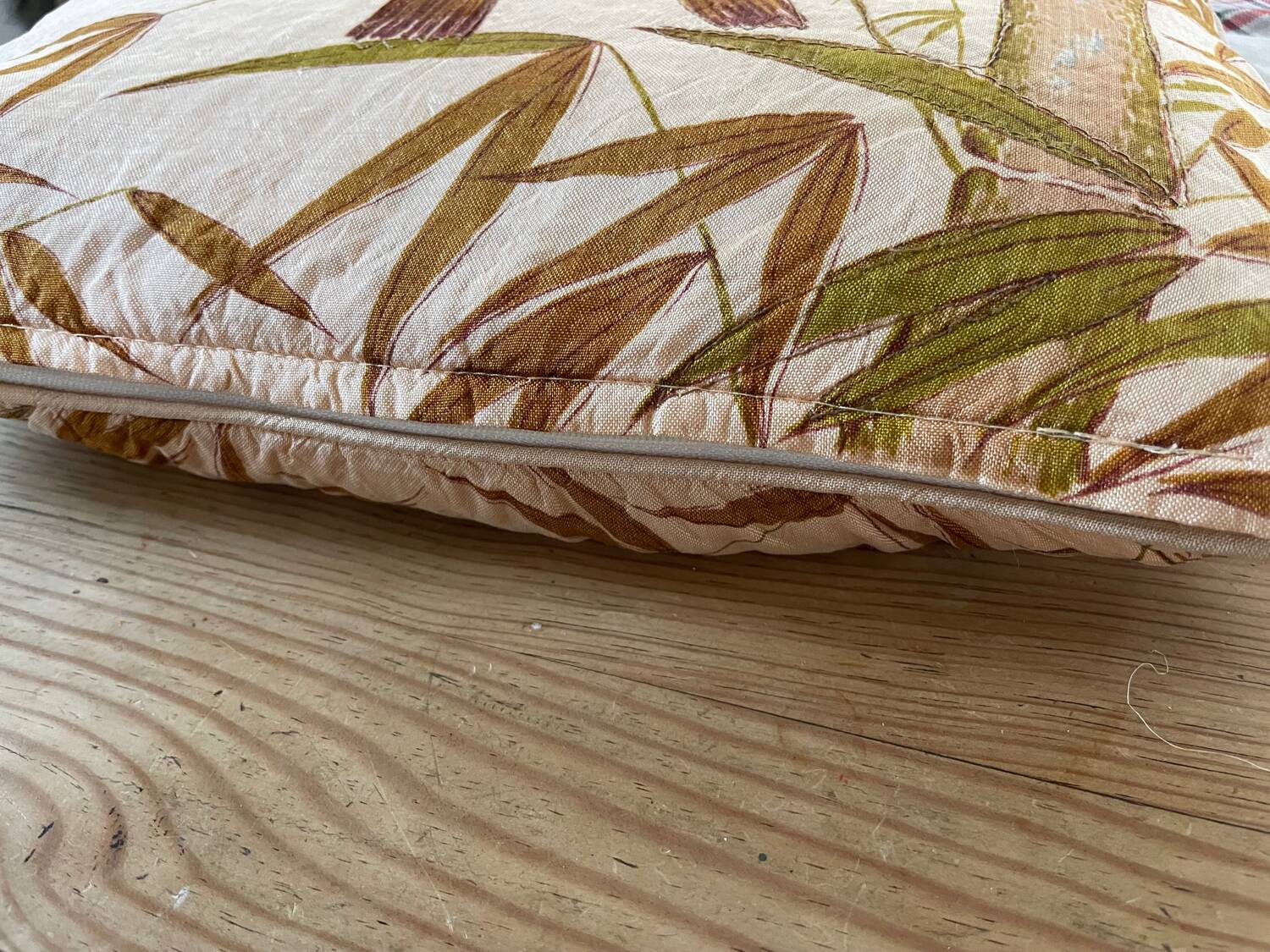 Vintage cushion decorated with birds, Thailand