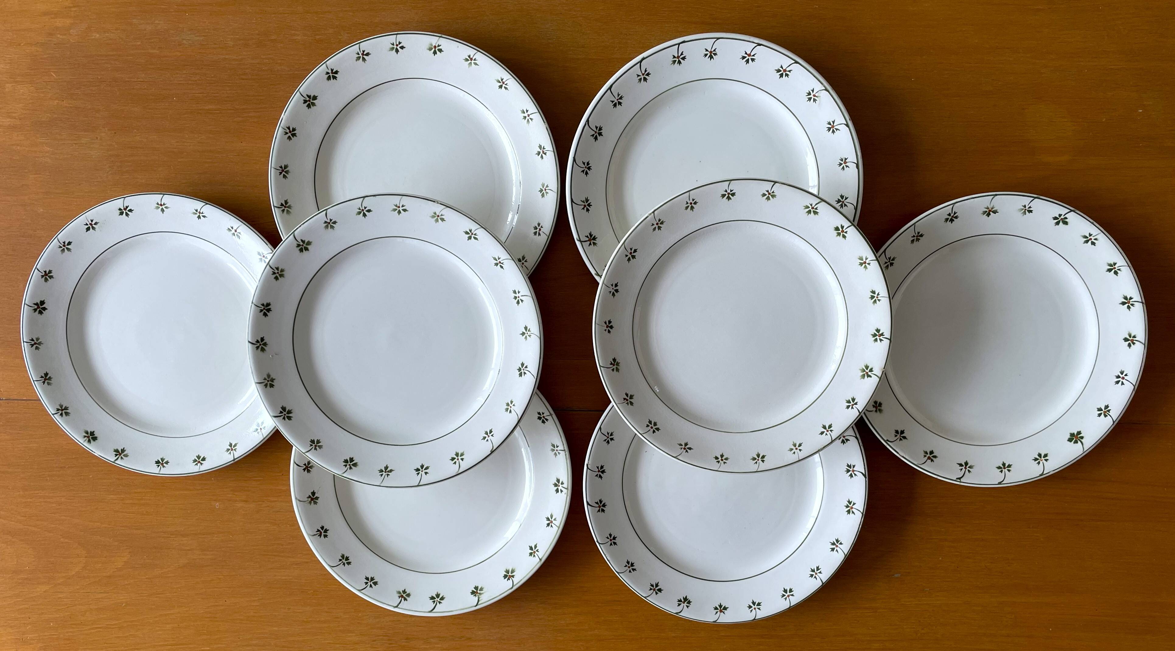 8 antique flat plates in Nimy earthenware