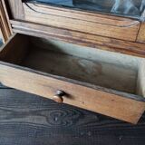 Old glass wall shelf with drawer door