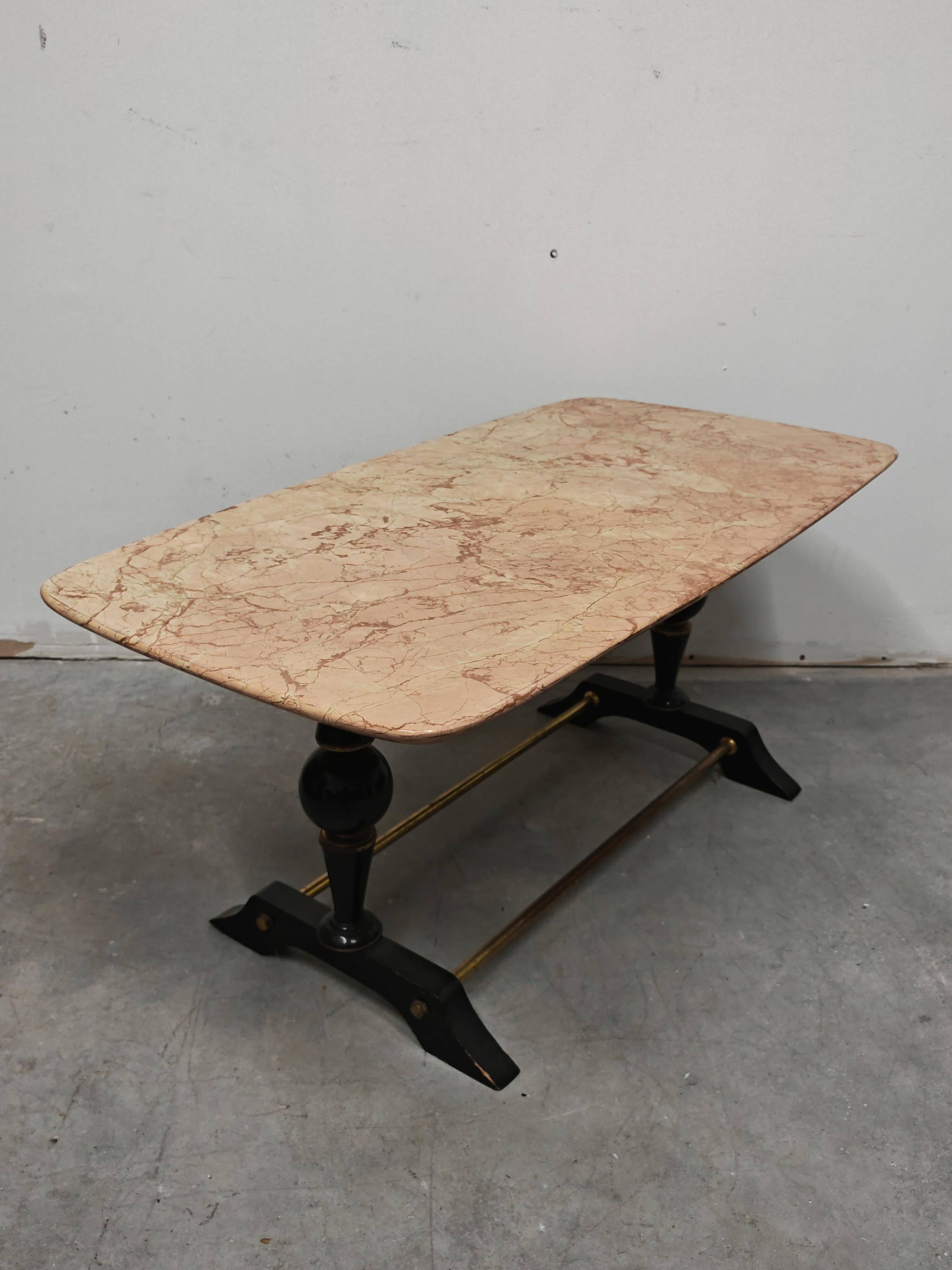Mid-century modern coffee table in marble, brass, and wood, 1950s.