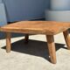 Coffee table in blond teak quadripod