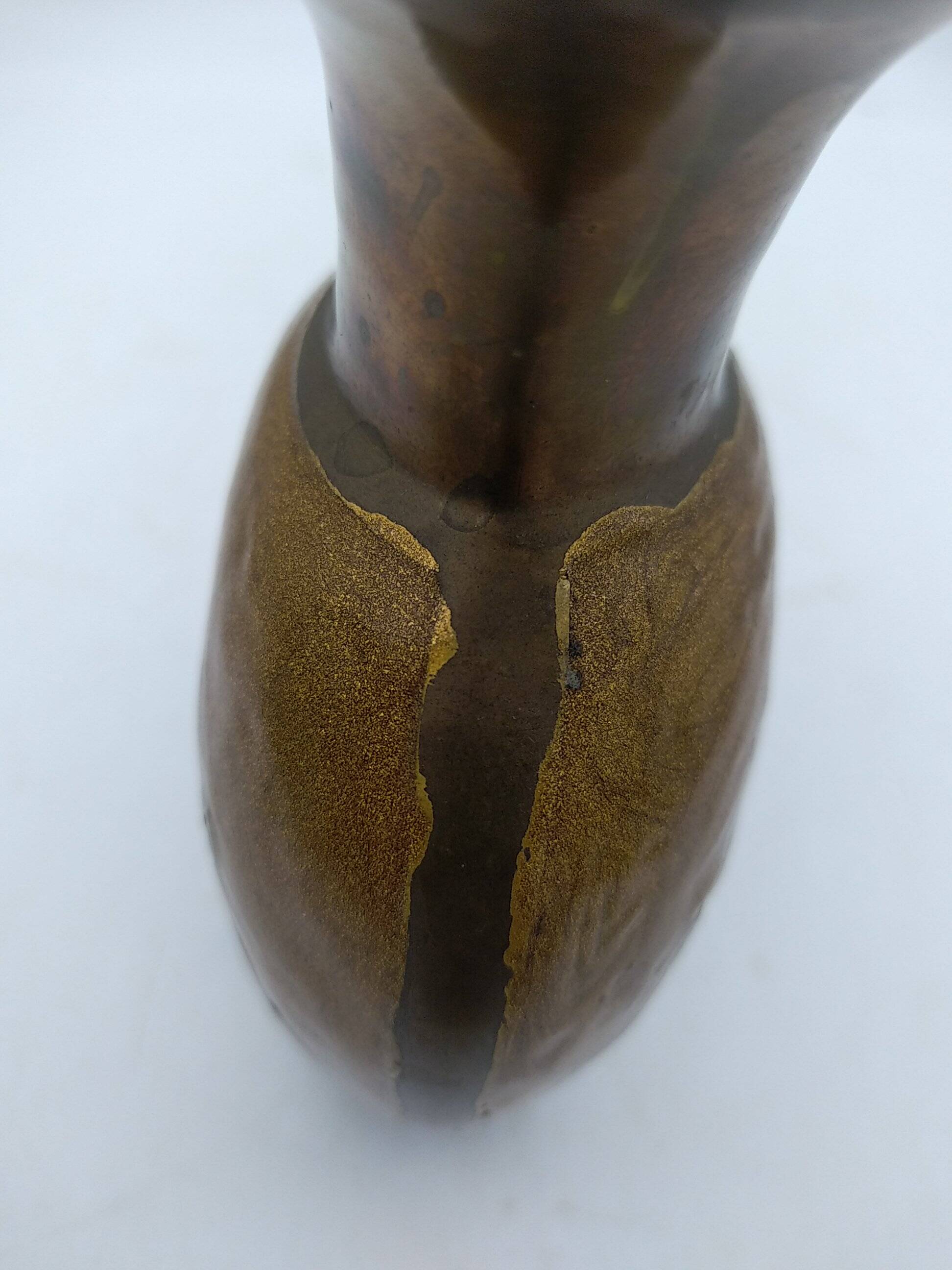 Enamelled brass vase decorated with owls.