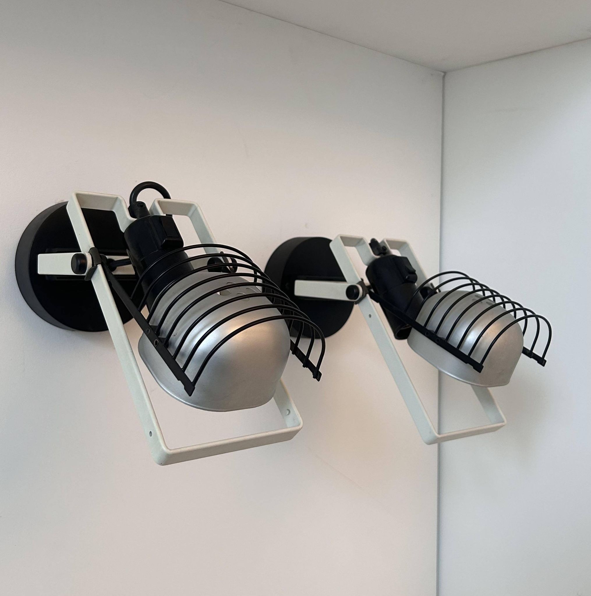 Pair of vintage Sintesi adjustable wall lights, by Gismonti for Artemide, Italy 1975