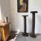 Pair of pedestal columns with oak pressing screws, 1900