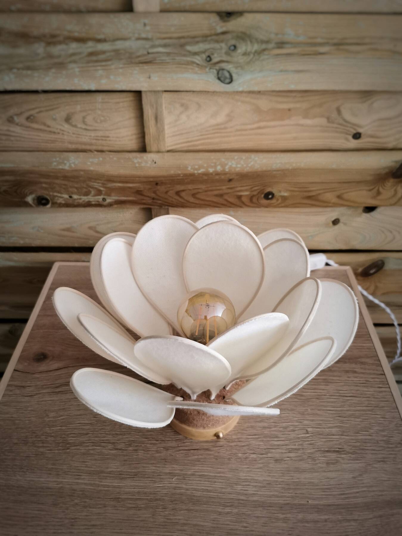 Flower table lamp made of rattan and ivory flannel petals