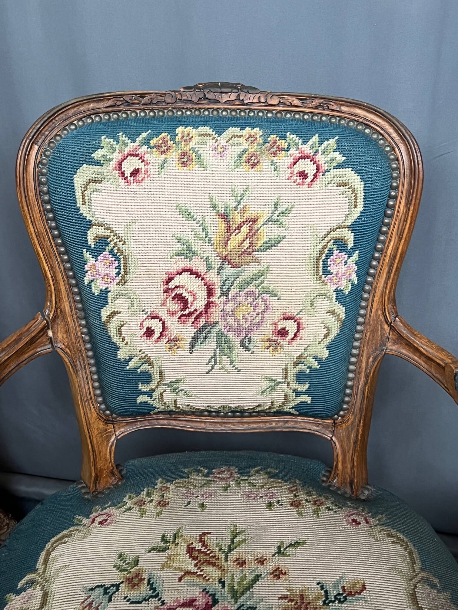 Pair of hand-embroidered armchairs. Walnut.